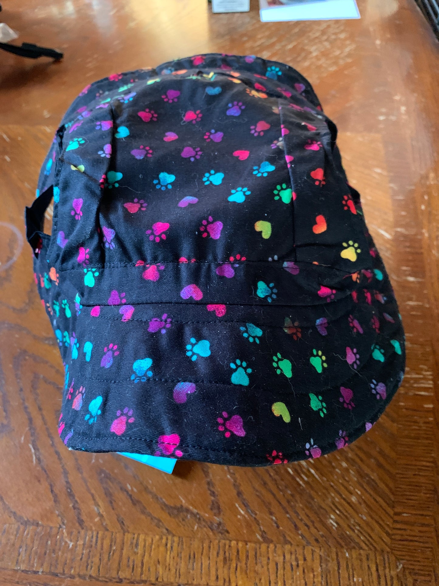 Multicoloured paw prints pet bucket hat