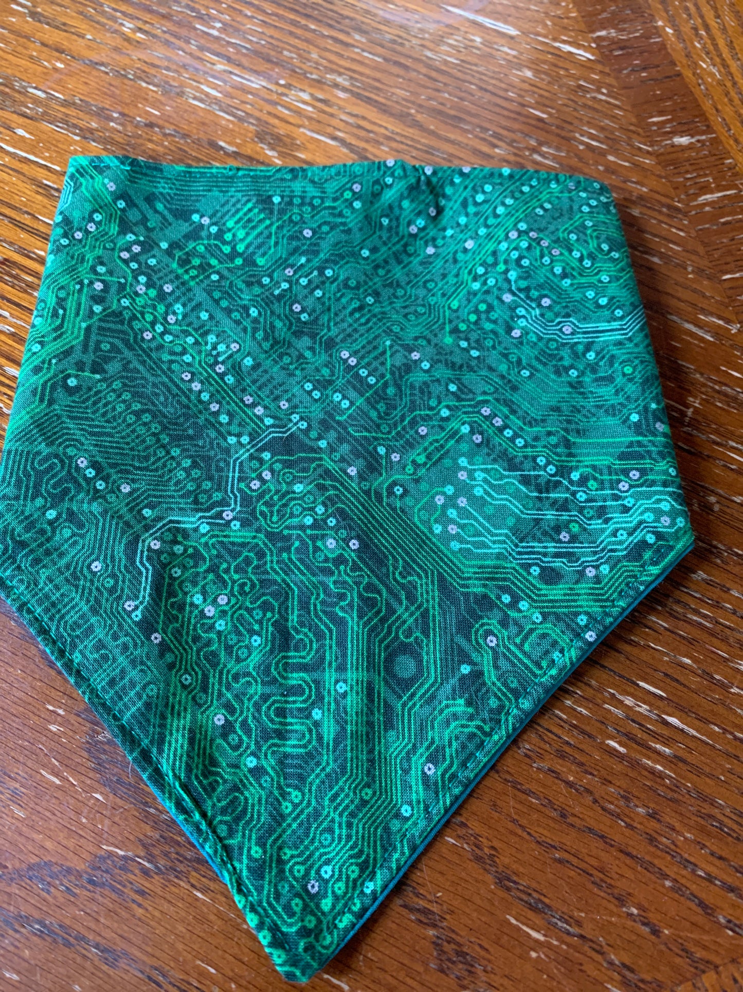 Silver circuits on green pet bandana