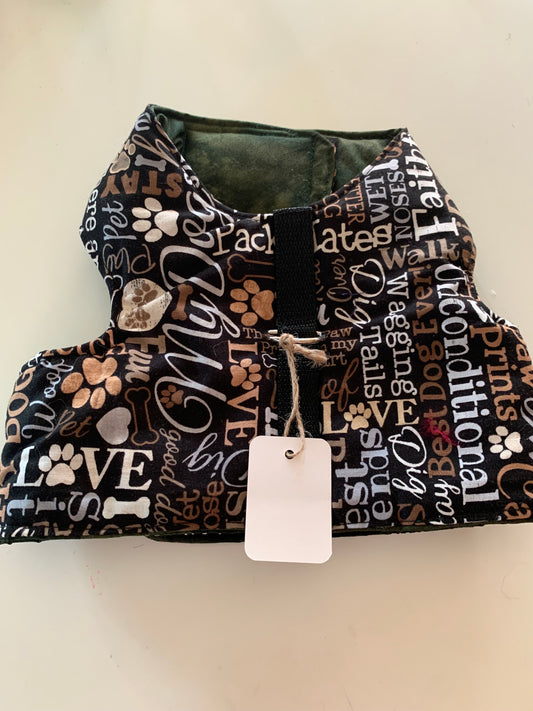 Writing on black pet harness