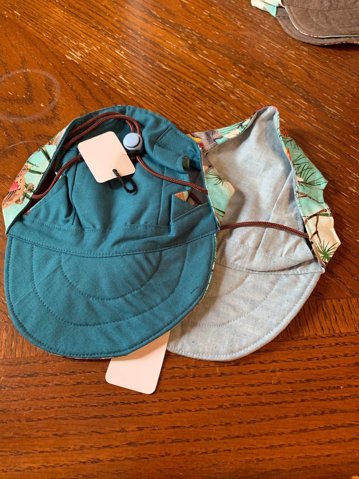 Birds on blue and white pet baseball hats