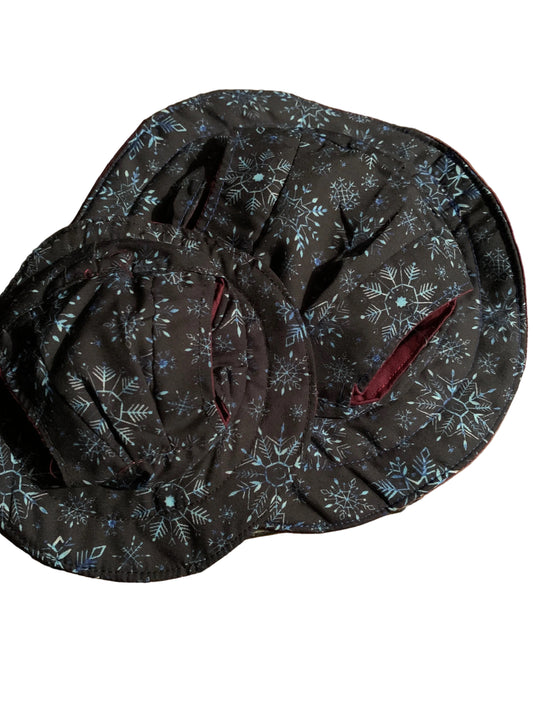 Blue snowflake on black pet bucket hat