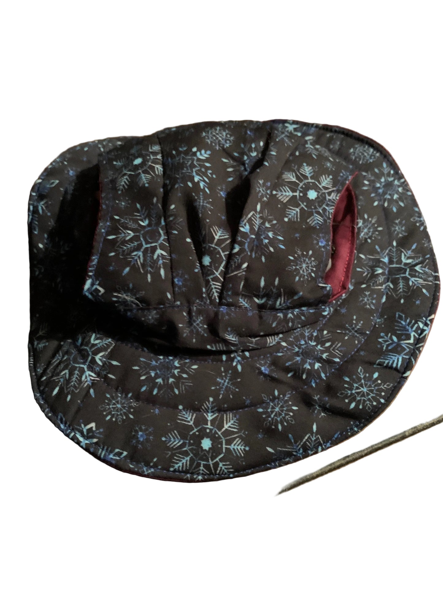 Blue snowflake on black pet bucket hat
