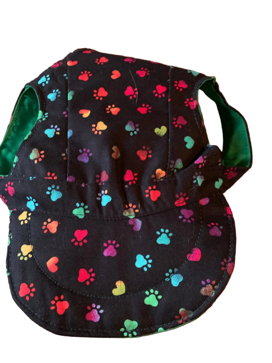 Multicoloured paw prints on black pet baseball hat