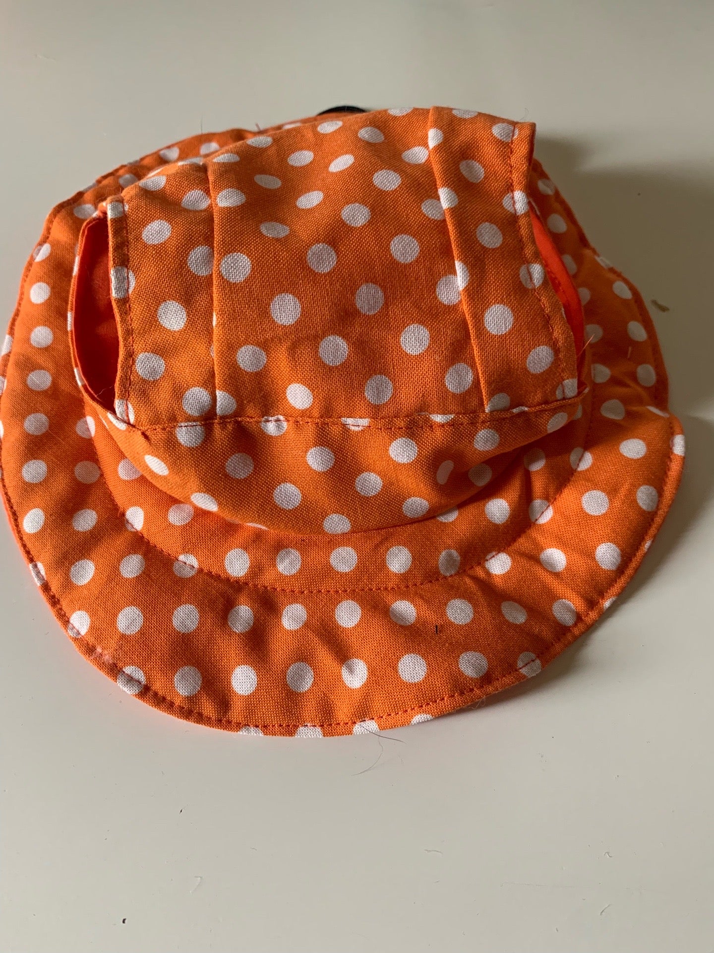 White dots on orange pet bucket hat